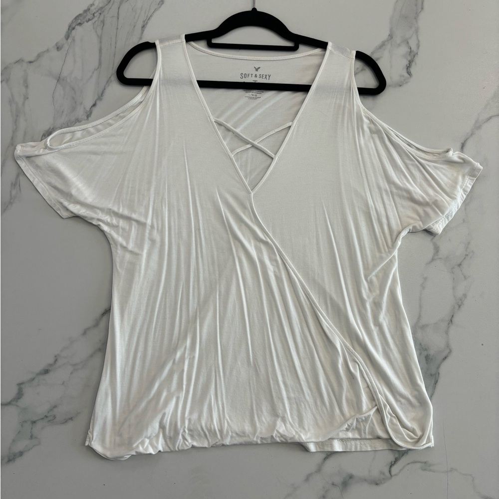 Cute white cold shoulder top- super soft and could be dressed up or down!